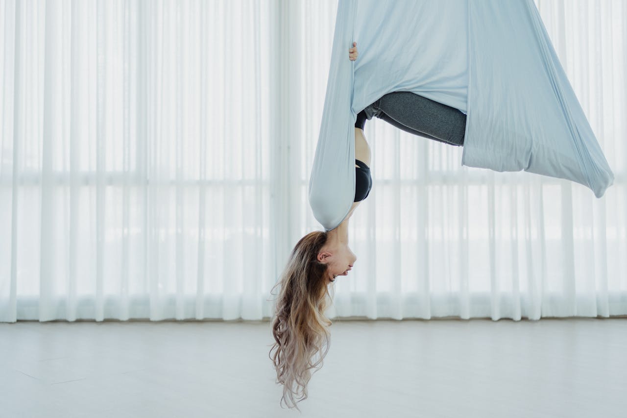 Woman Doing Aerial Yoga